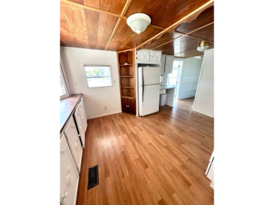 Come see this cozy 2 bed, 1 bath mobile home in the Highland on DeBary Golf and Country Club in Florida - for sale on GolfHomes.com, golf home, golf lot