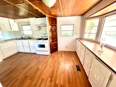 Come see this cozy 2 bed, 1 bath mobile home in the Highland on DeBary Golf and Country Club in Florida - for sale on GolfHomes.com, golf home, golf lot