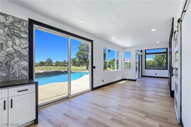 ** ONE OF A KIND BACKYARD SITS ON A LAKE AND TWO GOLF COURSE on Painted Desert Golf Club in Nevada - for sale on GolfHomes.com, golf home, golf lot