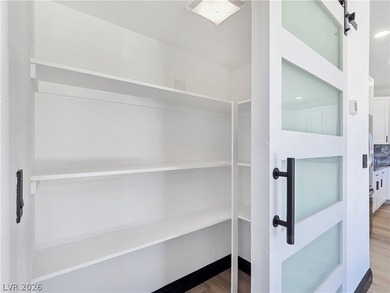 ** ONE OF A KIND BACKYARD SITS ON A LAKE AND TWO GOLF COURSE on Painted Desert Golf Club in Nevada - for sale on GolfHomes.com, golf home, golf lot