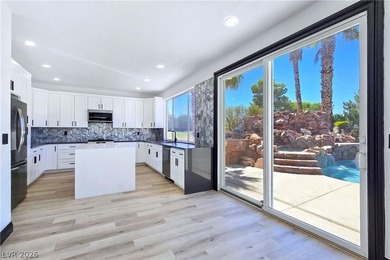 ** ONE OF A KIND BACKYARD SITS ON A LAKE AND TWO GOLF COURSE on Painted Desert Golf Club in Nevada - for sale on GolfHomes.com, golf home, golf lot