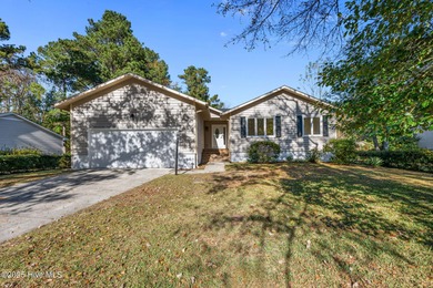 Welcome to 309 Channel Run, a stunning 3-bedroom, 2-bath home on River Bend Golf and Country Club in North Carolina - for sale on GolfHomes.com, golf home, golf lot