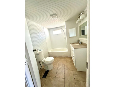 Come see this cozy 2 bed, 1 bath mobile home in the Highland on DeBary Golf and Country Club in Florida - for sale on GolfHomes.com, golf home, golf lot