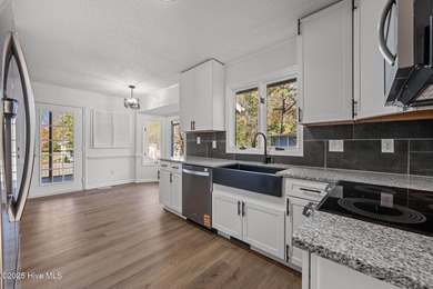 Welcome to 309 Channel Run, a stunning 3-bedroom, 2-bath home on River Bend Golf and Country Club in North Carolina - for sale on GolfHomes.com, golf home, golf lot