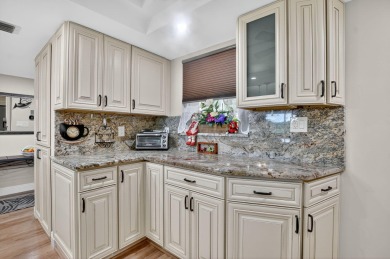 A East Boca Gem.  A Beautiful, renovated unit that is move-in on Ocean Breeze Golf and Country Club in Florida - for sale on GolfHomes.com, golf home, golf lot