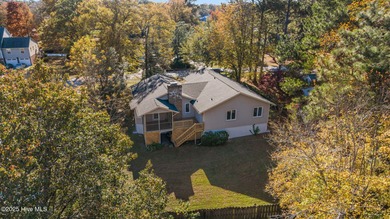 Welcome to 309 Channel Run, a stunning 3-bedroom, 2-bath home on River Bend Golf and Country Club in North Carolina - for sale on GolfHomes.com, golf home, golf lot