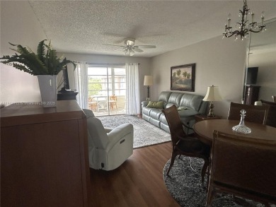 Beautiful one bedroom one bathroom condo in active 55+ community on Sunrise Lakes Phase III in Florida - for sale on GolfHomes.com, golf home, golf lot