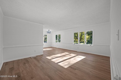 Welcome to 309 Channel Run, a stunning 3-bedroom, 2-bath home on River Bend Golf and Country Club in North Carolina - for sale on GolfHomes.com, golf home, golf lot