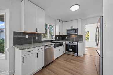 Welcome to 309 Channel Run, a stunning 3-bedroom, 2-bath home on River Bend Golf and Country Club in North Carolina - for sale on GolfHomes.com, golf home, golf lot