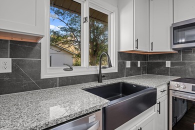 Welcome to 309 Channel Run, a stunning 3-bedroom, 2-bath home on River Bend Golf and Country Club in North Carolina - for sale on GolfHomes.com, golf home, golf lot