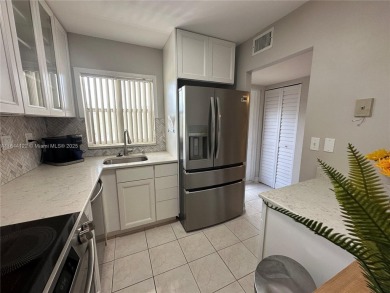 Beautiful one bedroom one bathroom condo in active 55+ community on Sunrise Lakes Phase III in Florida - for sale on GolfHomes.com, golf home, golf lot