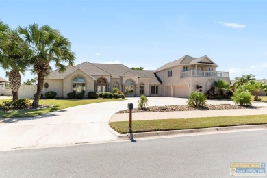 This beautifully designed lake front home is located in the on South Padre Island Golf Club in Texas - for sale on GolfHomes.com, golf home, golf lot