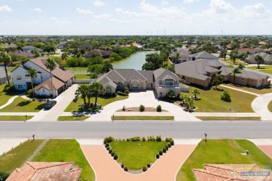 This beautifully designed lake front home is located in the on South Padre Island Golf Club in Texas - for sale on GolfHomes.com, golf home, golf lot