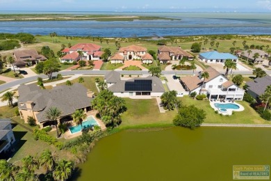 This beautifully designed lake front home is located in the on South Padre Island Golf Club in Texas - for sale on GolfHomes.com, golf home, golf lot