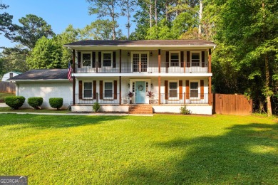 Discover this beautifully maintained brick 4-bedroom, 2.5-bath on Canongate At Flat Creek Club in Georgia - for sale on GolfHomes.com, golf home, golf lot