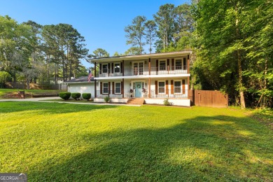 Discover this beautifully maintained brick 4-bedroom, 2.5-bath on Canongate At Flat Creek Club in Georgia - for sale on GolfHomes.com, golf home, golf lot