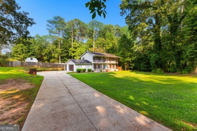 Discover this beautifully maintained brick 4-bedroom, 2.5-bath on Canongate At Flat Creek Club in Georgia - for sale on GolfHomes.com, golf home, golf lot