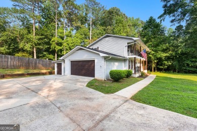 Discover this beautifully maintained brick 4-bedroom, 2.5-bath on Canongate At Flat Creek Club in Georgia - for sale on GolfHomes.com, golf home, golf lot