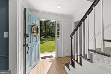 Discover this beautifully maintained brick 4-bedroom, 2.5-bath on Canongate At Flat Creek Club in Georgia - for sale on GolfHomes.com, golf home, golf lot