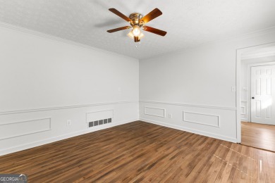Discover this beautifully maintained brick 4-bedroom, 2.5-bath on Canongate At Flat Creek Club in Georgia - for sale on GolfHomes.com, golf home, golf lot
