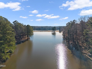 Imagine waking up to peaceful lake views and ending each day on Carolina Trace Country Club in North Carolina - for sale on GolfHomes.com, golf home, golf lot