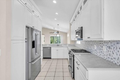 $20,000 PRICE ADJUSTMENT! Beautifully maintained 3BR/2BA pool on Tara Golf and Country Club in Florida - for sale on GolfHomes.com, golf home, golf lot