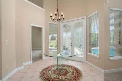 Step into this 5-bedroom, 4-bathroom gem nestled in the heart of on MetroWest Golf Club in Florida - for sale on GolfHomes.com, golf home, golf lot