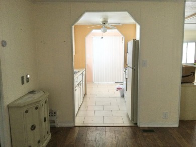 Nicely maintained home in the much sought after Spanish Lakes on Spanish Lakes I in Florida - for sale on GolfHomes.com, golf home, golf lot