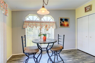 Beautifully maintained home built in 2002, offering over 1,500 on Barefoot Bay Golf Course in Florida - for sale on GolfHomes.com, golf home, golf lot