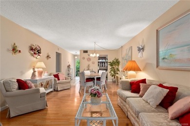 This cozy condo offers everything you need for Florida living on Monterey Yacht and Country Club in Florida - for sale on GolfHomes.com, golf home, golf lot