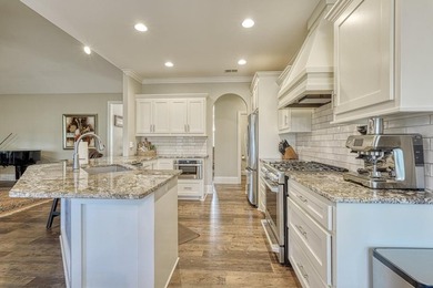 Beautifully designed 4 bedroom/3.5 bathroom home tucked away on on Woodfin Ridge Golf Club in South Carolina - for sale on GolfHomes.com, golf home, golf lot