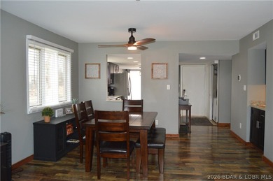 This ground-floor, 1-story, end unit offers plenty of room for on Seasons Ridge At Four Seasons in Missouri - for sale on GolfHomes.com, golf home, golf lot