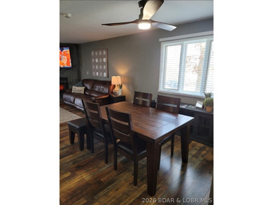 This ground-floor, 1-story, end unit offers plenty of room for on Seasons Ridge At Four Seasons in Missouri - for sale on GolfHomes.com, golf home, golf lot