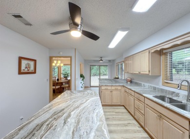 Discover the epitome of move-in-ready luxury at 26 Emmanuel on DeSoto Golf Course in Arkansas - for sale on GolfHomes.com, golf home, golf lot