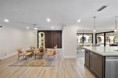 Beautiful, fully renovated modern retreat on the golf course in on Country Club of Coral Springs in Florida - for sale on GolfHomes.com, golf home, golf lot