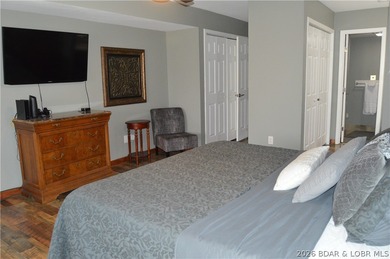 This ground-floor, 1-story, end unit offers plenty of room for on Seasons Ridge At Four Seasons in Missouri - for sale on GolfHomes.com, golf home, golf lot