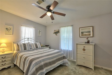 Beautifully maintained home built in 2002, offering over 1,500 on Barefoot Bay Golf Course in Florida - for sale on GolfHomes.com, golf home, golf lot