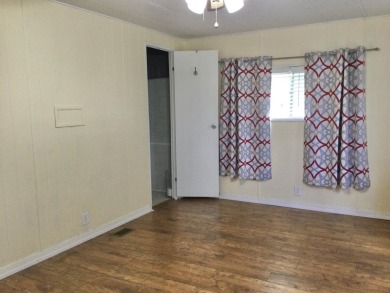 Nicely maintained home in the much sought after Spanish Lakes on Spanish Lakes I in Florida - for sale on GolfHomes.com, golf home, golf lot
