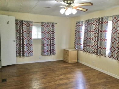Nicely maintained home in the much sought after Spanish Lakes on Spanish Lakes I in Florida - for sale on GolfHomes.com, golf home, golf lot