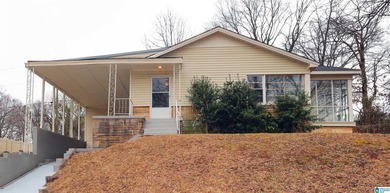 Welcome home! Located within walking distance of the Anniston on Anniston Municipal Golf Course in Alabama - for sale on GolfHomes.com, golf home, golf lot