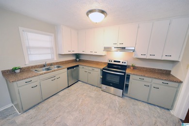 Welcome home! Located within walking distance of the Anniston on Anniston Municipal Golf Course in Alabama - for sale on GolfHomes.com, golf home, golf lot