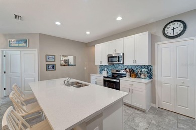 Elegantly maintained and beautifully appointed, this 3-bedroom on The Founders Golf Club in Florida - for sale on GolfHomes.com, golf home, golf lot