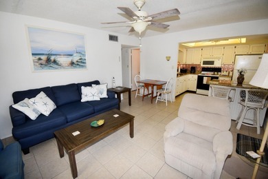 Rarely available ground floor end unit. Easy access to Sharkey's on Lake Venice Golf Club in Florida - for sale on GolfHomes.com, golf home, golf lot