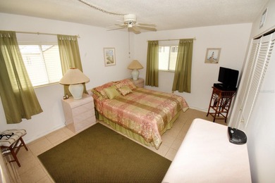 Rarely available ground floor end unit. Easy access to Sharkey's on Lake Venice Golf Club in Florida - for sale on GolfHomes.com, golf home, golf lot