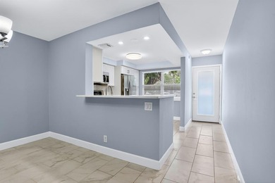 Seller is ready to make a deal -- offering closing concessions on Wynmoor Golf Course in Florida - for sale on GolfHomes.com, golf home, golf lot