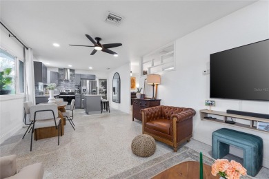 You don't want to miss this stunning, updated corner lot home in on Mangrove Bay Golf Course in Florida - for sale on GolfHomes.com, golf home, golf lot