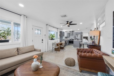 You don't want to miss this stunning, updated corner lot home in on Mangrove Bay Golf Course in Florida - for sale on GolfHomes.com, golf home, golf lot