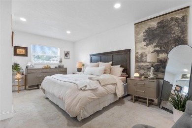 You don't want to miss this stunning, updated corner lot home in on Mangrove Bay Golf Course in Florida - for sale on GolfHomes.com, golf home, golf lot