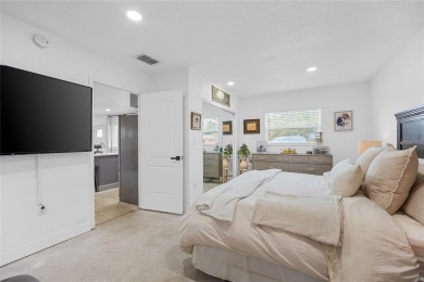 You don't want to miss this stunning, updated corner lot home in on Mangrove Bay Golf Course in Florida - for sale on GolfHomes.com, golf home, golf lot