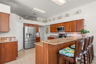 Welcome to this stunning 4-bedroom, 3-bath home featuring a on East Lake Woodlands Country Club in Florida - for sale on GolfHomes.com, golf home, golf lot